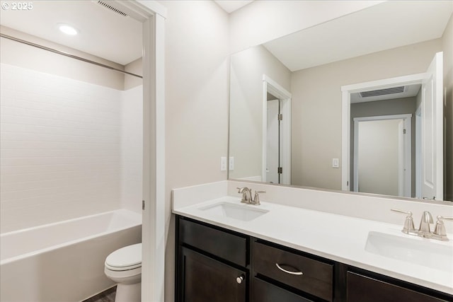 7119 NE 152nd Pl, Vancouver, WA 98682 - bathroom featuring toilet, double vanity, and shower / bathtub combination