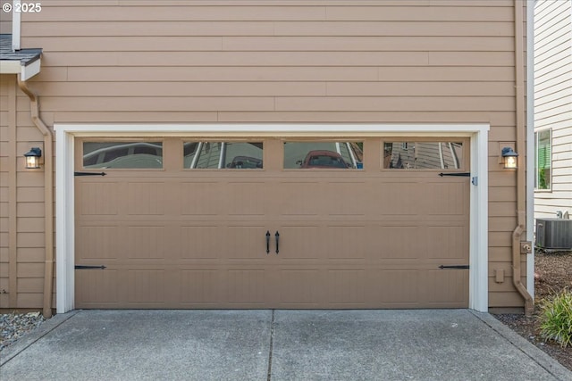 7119 NE 152nd Pl, Vancouver, WA 98682 - garage with central AC unit and concrete driveway
