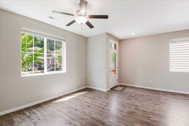 7119 NE 152nd Pl, Vancouver, WA 98682 - empty room with wood finished floors, a ceiling fan, baseboards, and recessed lighting