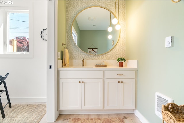 4633 SE 35th Ave Unit B, Portland, OR 97202 - bathroom with vanity and baseboards