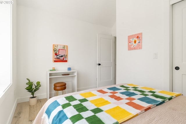 4633 SE 35th Ave Unit B, Portland, OR 97202 - bedroom featuring wood finished floors and baseboards