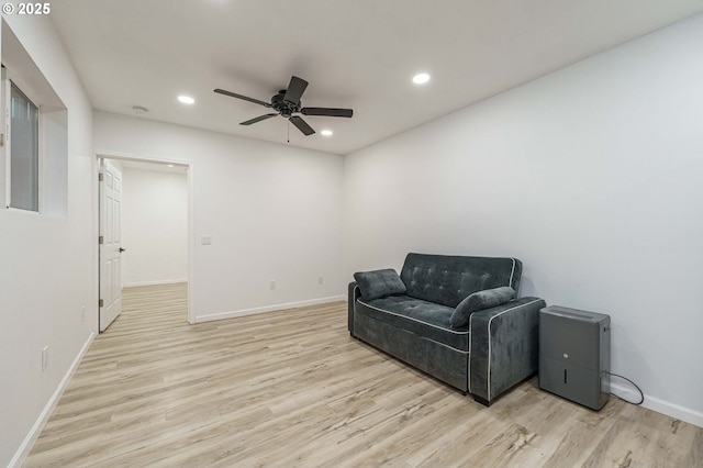 sitting room with recessed lighting, baseboards, light wood-style floors, and ceiling fan