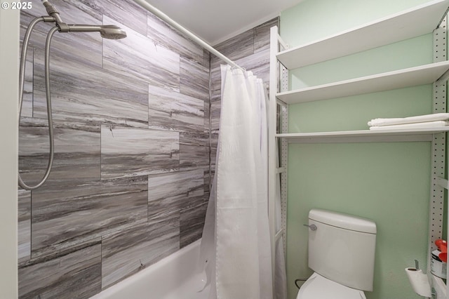 bathroom with shower / bathtub combination with curtain and toilet