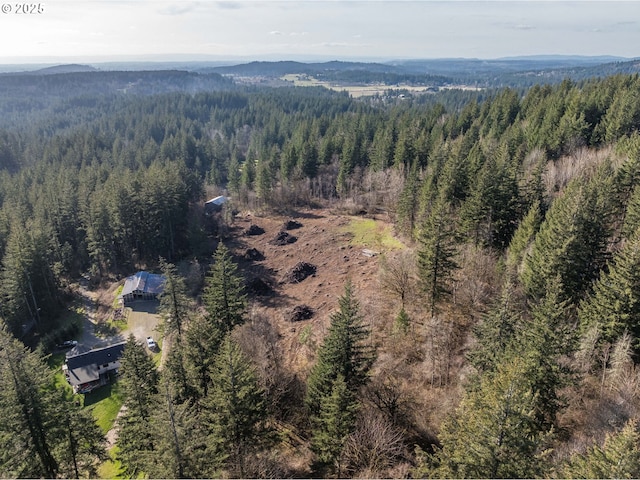 aerial view featuring a view of trees