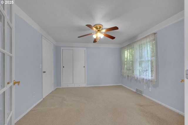 150 Maynard Ave, Eugene, OR 97404 - spare room featuring ceiling fan, carpet flooring, baseboards, and ornamental molding