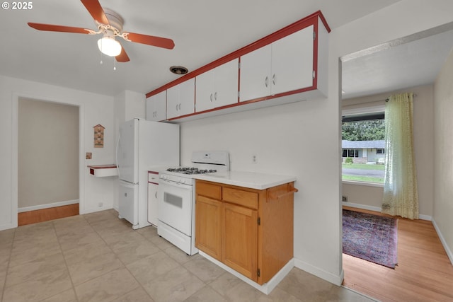 150 Maynard Ave, Eugene, OR 97404 - kitchen featuring white appliances, a ceiling fan, light countertops, and baseboards