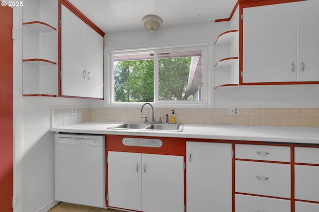 150 Maynard Ave, Eugene, OR 97404 - kitchen with white dishwasher, a sink, open shelves, light countertops, and white cabinets
