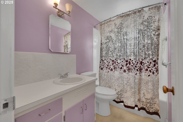 150 Maynard Ave, Eugene, OR 97404 - full bathroom featuring toilet, vanity, shower / bath combo, and tile patterned flooring