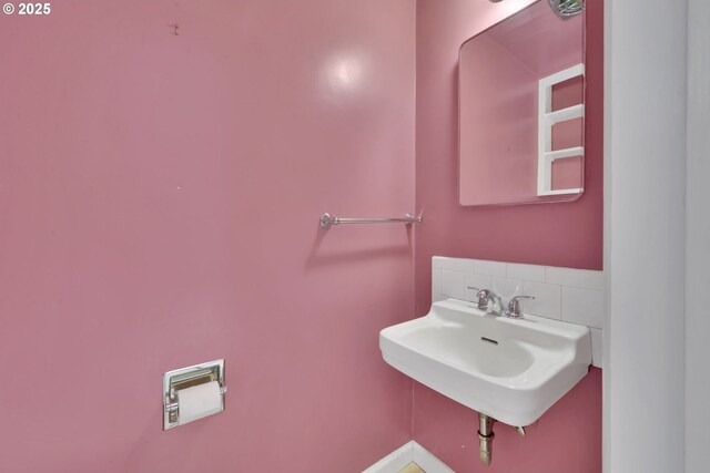 150 Maynard Ave, Eugene, OR 97404 - bathroom with a sink and baseboards