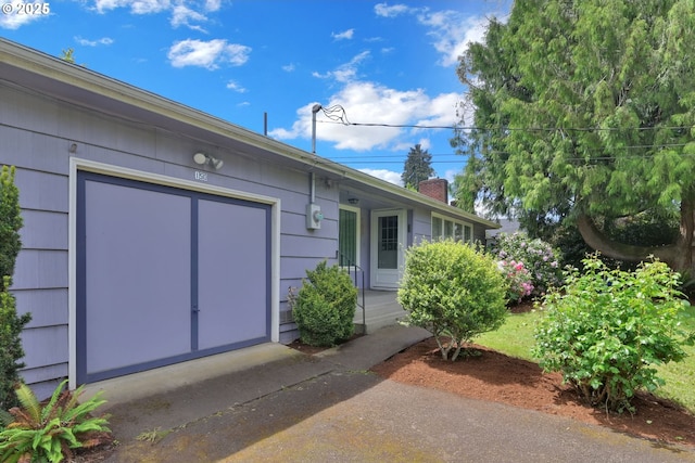 150 Maynard Ave, Eugene, OR 97404 - property entrance with a chimney