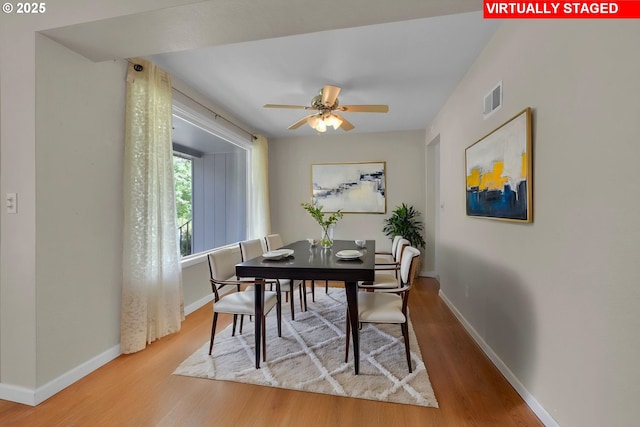 150 Maynard Ave, Eugene, OR 97404 - dining room with wood finished floors, baseboards, and a ceiling fan