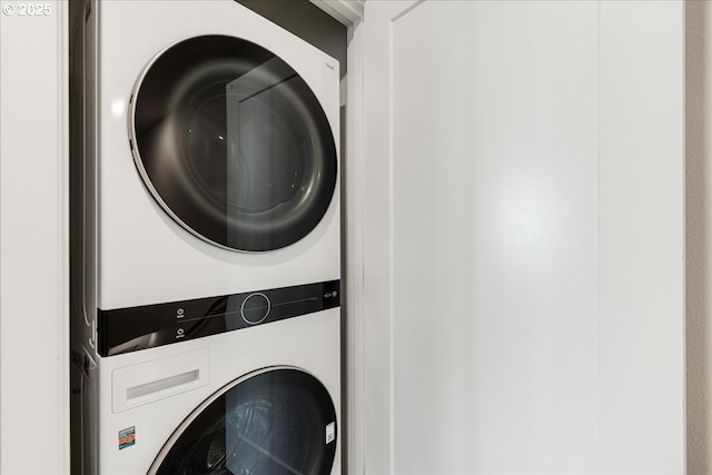 laundry room featuring stacked washing maching and dryer