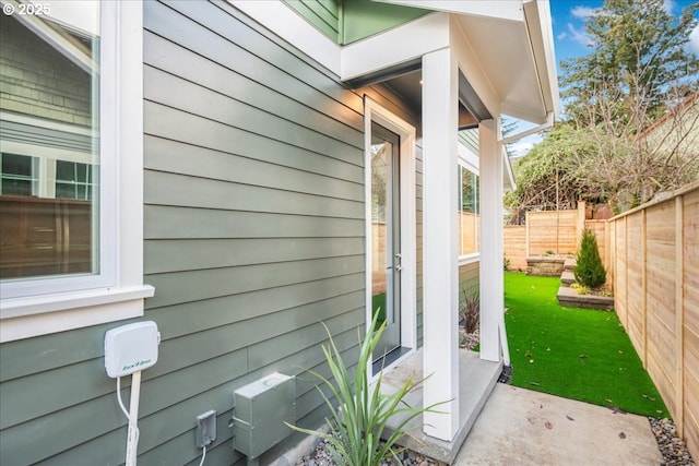 view of property exterior with a yard