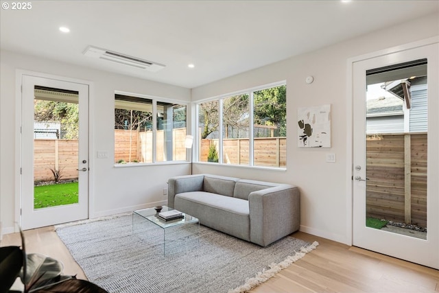 sunroom with plenty of natural light