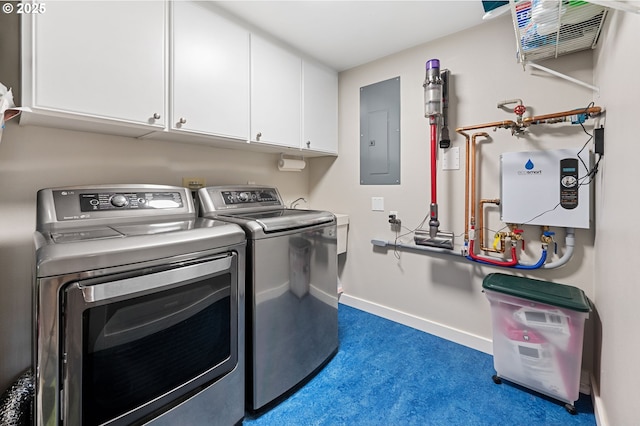 766 NW Westover Sq, Portland, OR 97210 - laundry area featuring cabinet space, electric panel, and washer and dryer