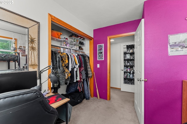 spacious closet with carpet floors
