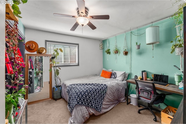 bedroom featuring carpet and a ceiling fan