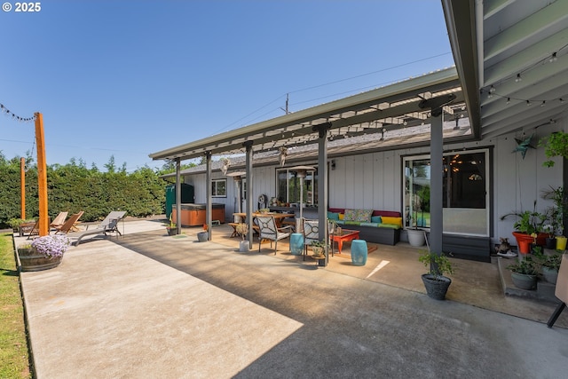 view of patio with an outdoor living space, a pergola, and a hot tub
