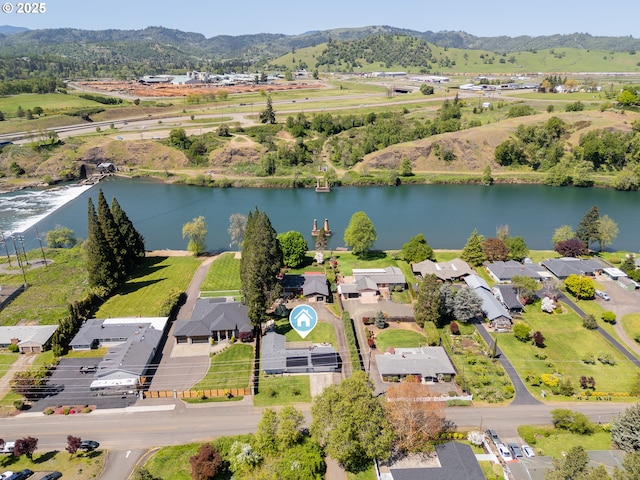 bird's eye view featuring a water and mountain view