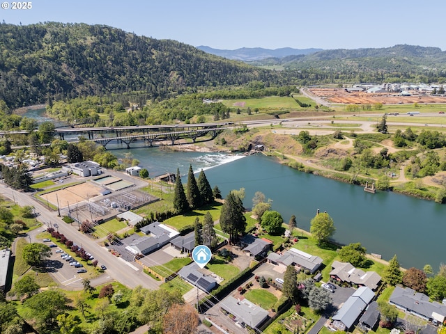 bird's eye view with a water and mountain view