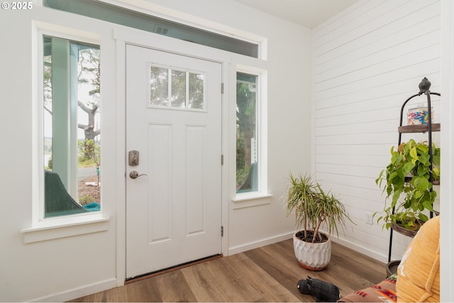 1937 NE 7th Dr, Lincoln City, OR 97367 - entrance foyer featuring wood finished floors, baseboards, and wood walls