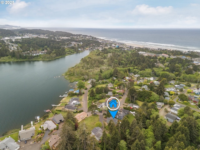 1937 NE 7th Dr, Lincoln City, OR 97367 - aerial view of property and surrounding area featuring a nearby body of water and nearby suburban area