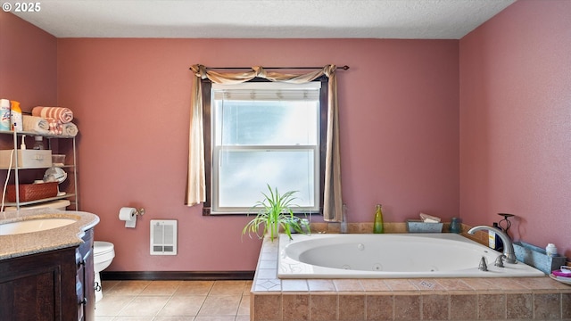 468 E Sunset Dr, Hermiston, OR 97838 - bathroom with a jetted tub, vanity, tile patterned floors, and heating unit
