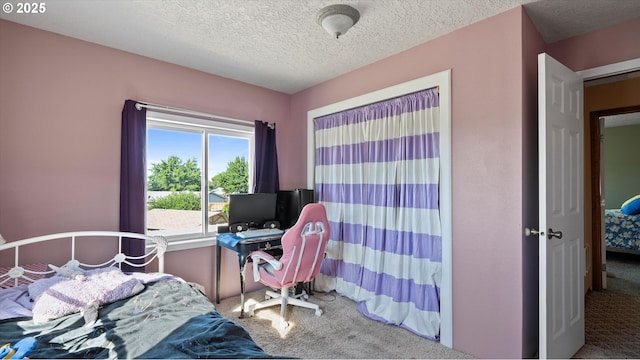 468 E Sunset Dr, Hermiston, OR 97838 - carpeted bedroom with a textured ceiling and an office area