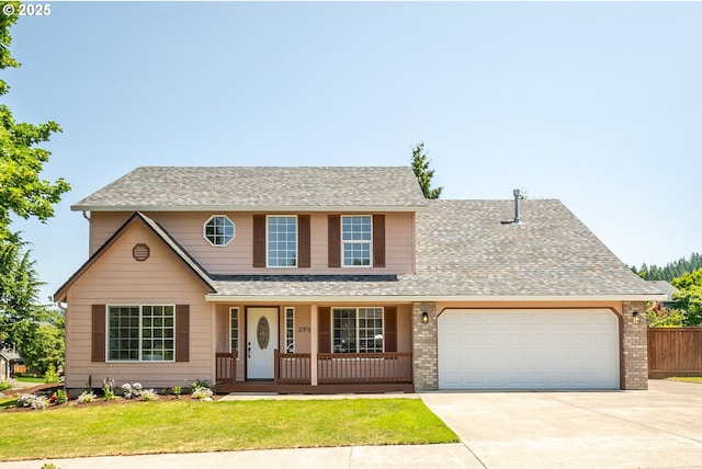 2952 NW Ogden St, Camas, WA 98607 - traditional-style house featuring covered porch, an attached garage, concrete driveway, a shingled roof, and brick siding