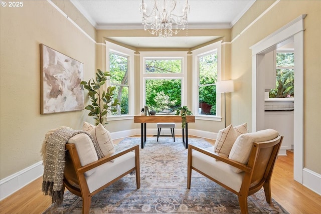 1520 SE 54th Ave, Portland, OR 97215 - sitting room with crown molding, a chandelier, wood finished floors, and an office area