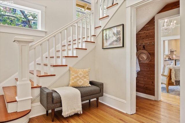 1520 SE 54th Ave, Portland, OR 97215 - stairway featuring healthy amount of natural light, wood finished floors, and baseboards