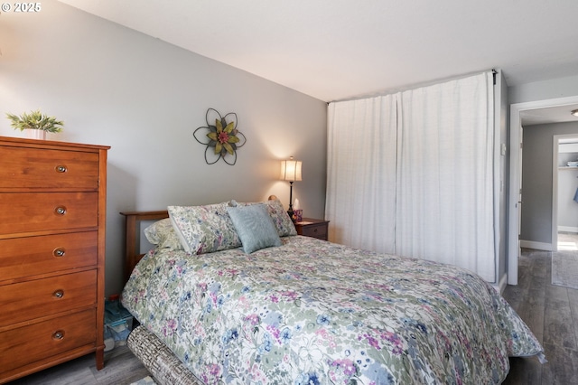 29460 SW Volley St Unit 72, Wilsonville, OR 97070 - bedroom featuring baseboards and wood finished floors