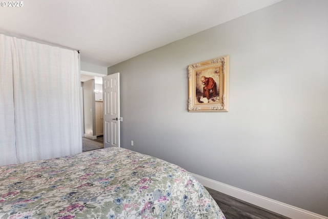 29460 SW Volley St Unit 72, Wilsonville, OR 97070 - bedroom with baseboards and dark wood-style floors