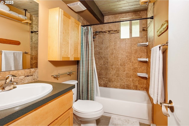 full bath with shower / bathtub combination with curtain, vanity, and toilet