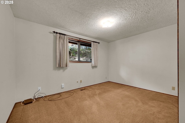 1770 W 28th Ave, Eugene, OR 97405 - empty room featuring carpet and a textured ceiling