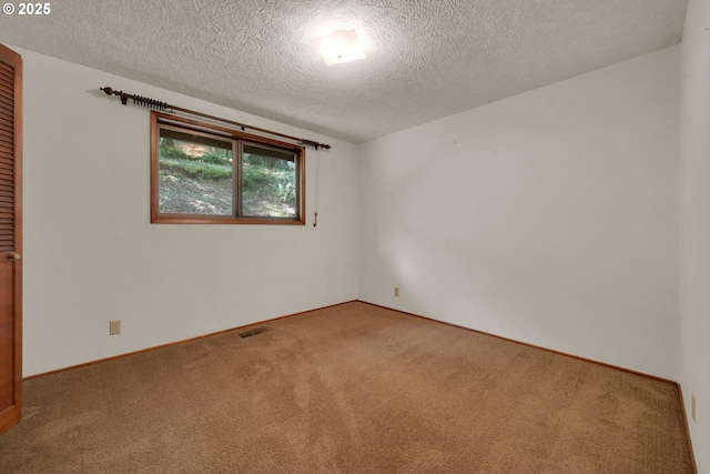1770 W 28th Ave, Eugene, OR 97405 - carpeted empty room featuring a textured ceiling