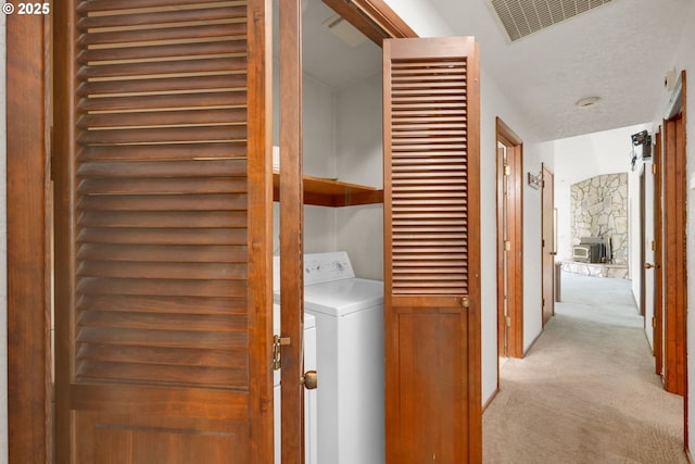 1770 W 28th Ave, Eugene, OR 97405 - laundry area with washer / dryer and carpet floors