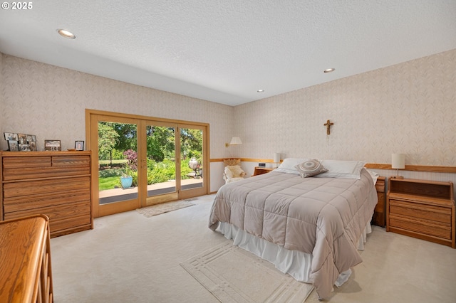 22750 SW Rosedale Rd, Beaverton, OR 97078 - bedroom with wallpapered walls, carpet floors, access to exterior, a textured ceiling, and recessed lighting