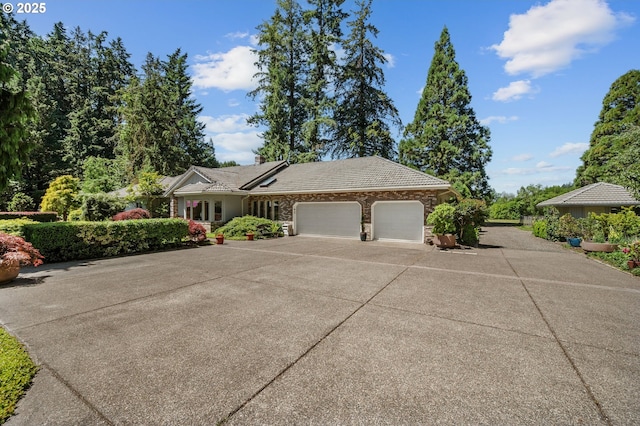 22750 SW Rosedale Rd, Beaverton, OR 97078 - view of front of house featuring an attached garage and driveway
