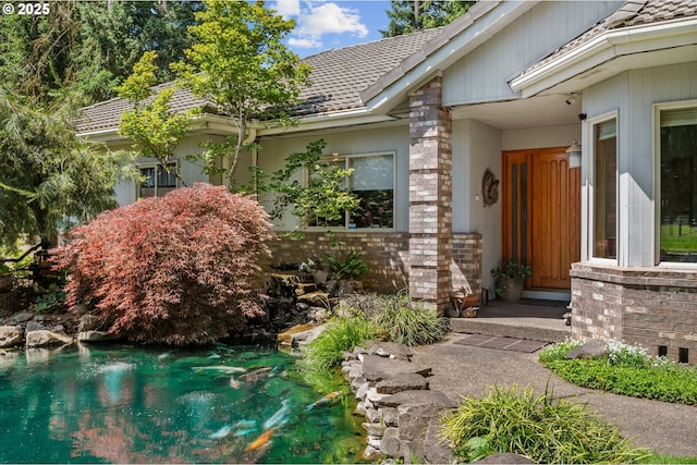 22750 SW Rosedale Rd, Beaverton, OR 97078 - doorway to property with a small pond