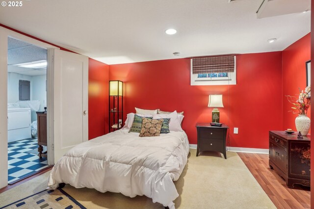 1917 NE Fremont St, Portland, OR 97212 - bedroom with recessed lighting, washing machine and dryer, baseboards, and wood finished floors