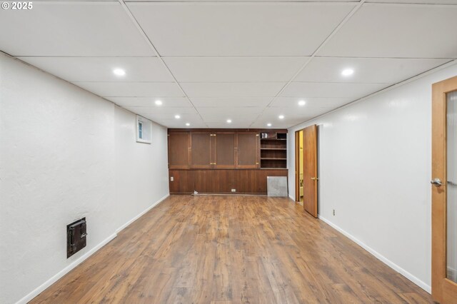 1917 NE Fremont St, Portland, OR 97212 - finished below grade area featuring wood finished floors, baseboards, and recessed lighting
