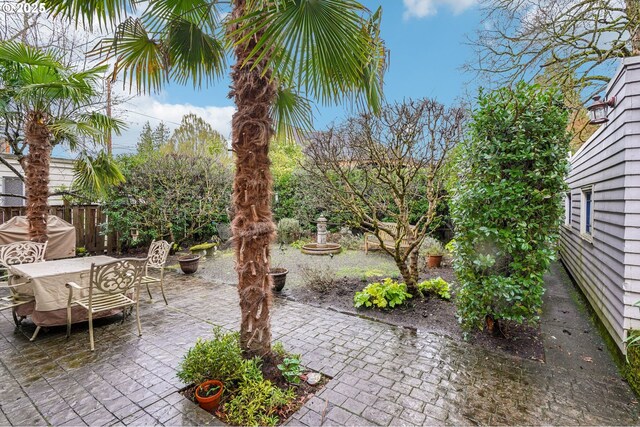 1917 NE Fremont St, Portland, OR 97212 - view of patio featuring outdoor dining area, fence, and grilling area