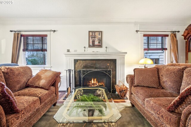 1917 NE Fremont St, Portland, OR 97212 - living room with a tile fireplace, wood finished floors, and crown molding