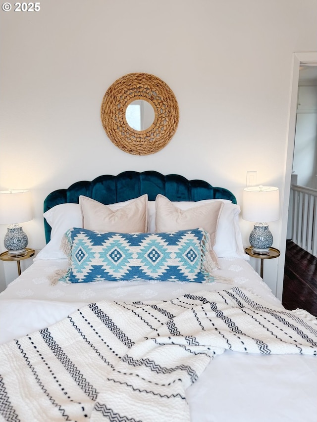 bedroom with wood finished floors