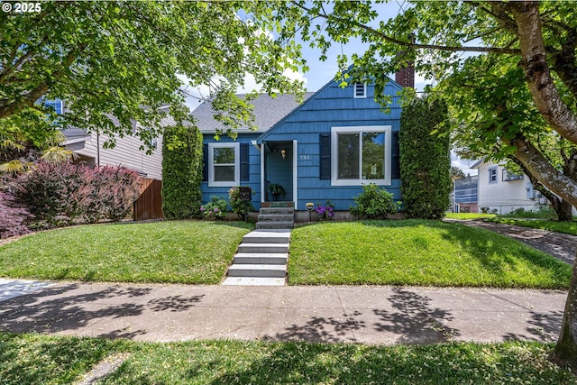 904 NE 78th Ave, Portland, OR 97213 - bungalow-style home with a chimney and roof with shingles