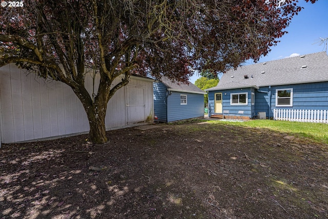 904 NE 78th Ave, Portland, OR 97213 - back of house featuring a shingled roof