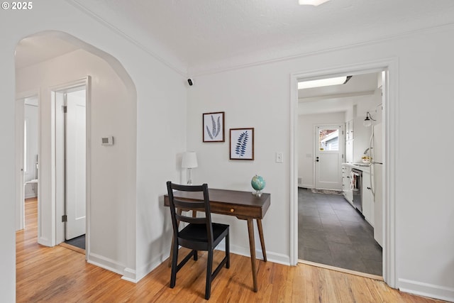 904 NE 78th Ave, Portland, OR 97213 - office space with arched walkways, light wood-style floors, ornamental molding, and baseboards