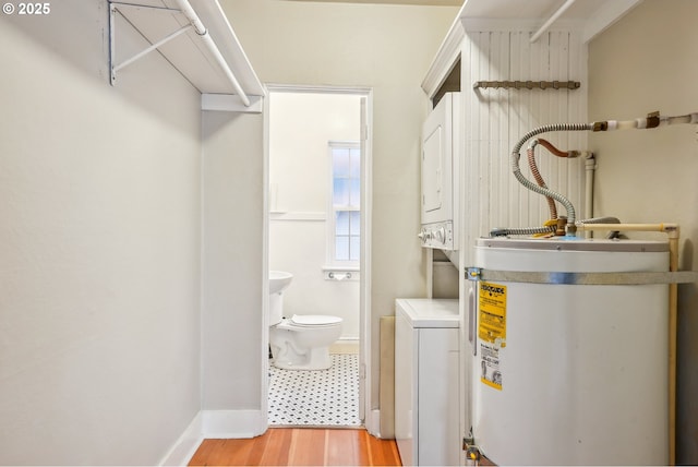 interior space featuring light hardwood / wood-style floors and stacked washer and clothes dryer