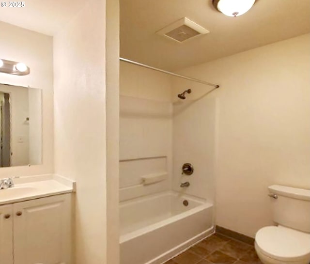 bathroom with baseboards, visible vents, toilet,  shower combination, and vanity